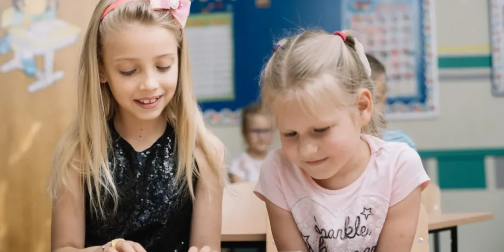 Girls Reading Book Classroom