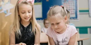 Girls Reading Book Classroom