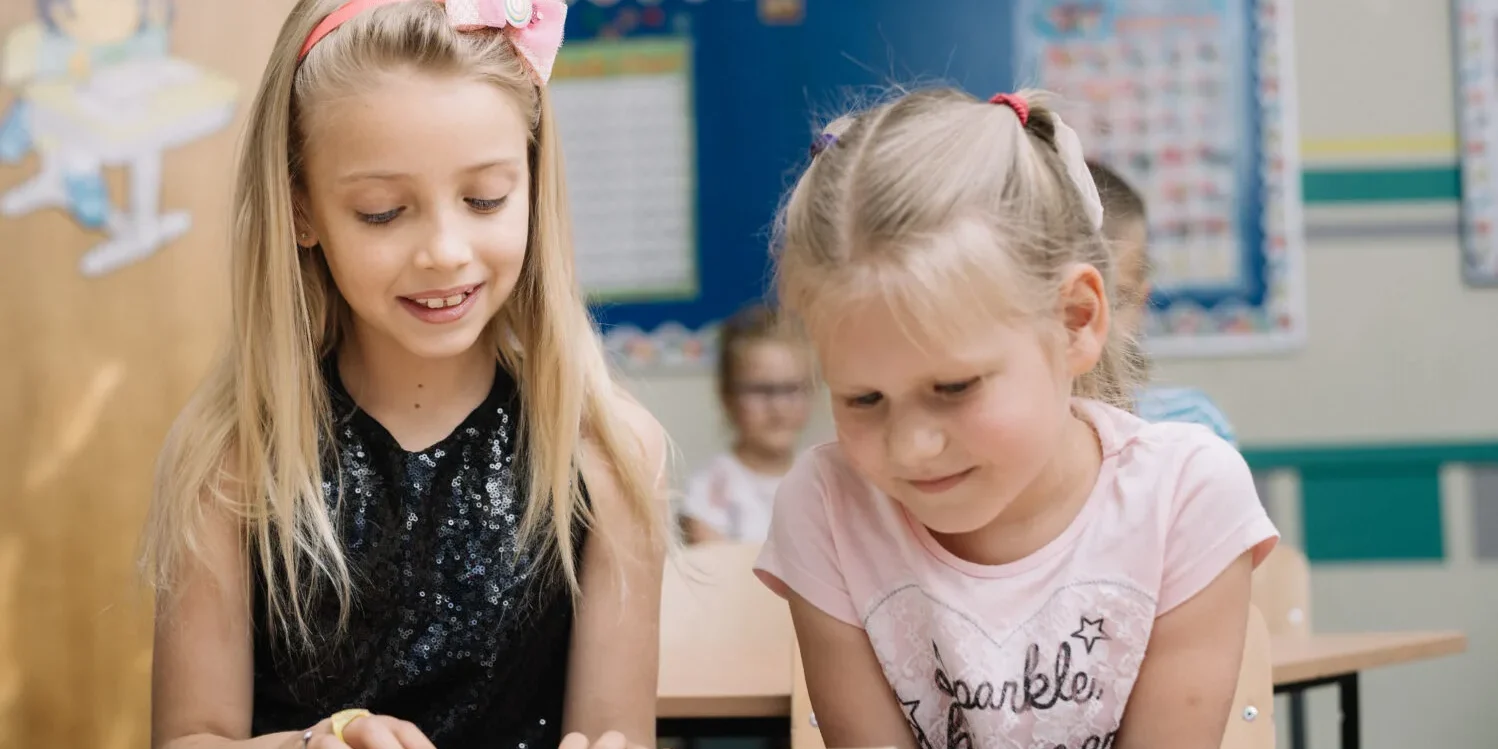 Girls Reading Book Classroom