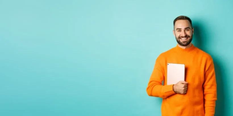 Handsome Freelancer Man Holding Laptop Smiling Standing Happy Light Blue Background Handsome Freelancer Man Holding Laptop Smiling Standing Happy Light Blue Background
