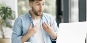 Man With Airpods Video Call Laptop Man With Airpods Video Call Laptop